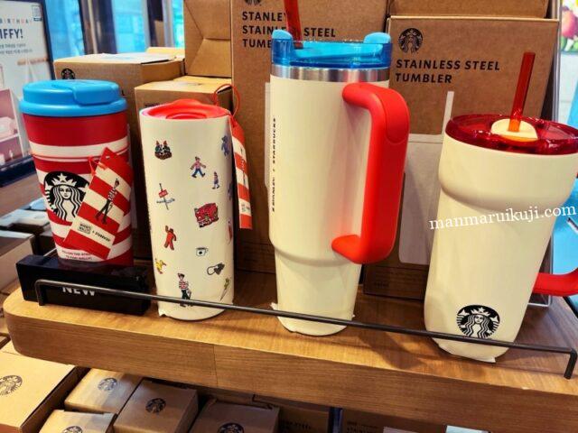 ウォーリー柄やスタバロゴ入りのカラフルなタンブラーが並ぶスターバックス韓国の売り場